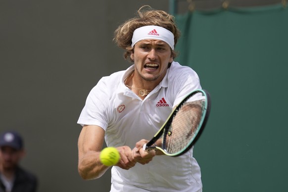 Germany&#039;s Alexander Zverev plays a return to Tennys Sandgren of the US during the men&#039;s singles second round match on day four of the Wimbledon Tennis Championships in London, Thursday July  ...