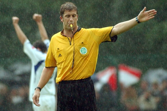 FILE- Referee Robert Hoyzer is seen during the German soccer cup match between Paderborner SC and Hamburger SV in Paderborn, Germany, in this Aug. 21, 2004 file photo. A match fixing and betting scand ...