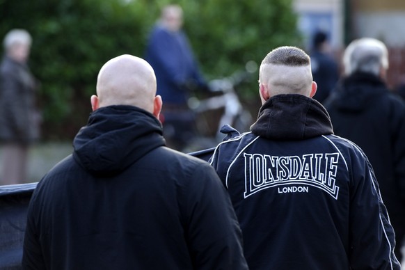 MAGDEBURG, GERMANY - JANUARY 18: Neo-Nazis march to commemorate the Allied bombing of the city of Magdeburg during World War II, on January 18, 2014 in Magdeburg, Germany. According to police, 700 Neo ...