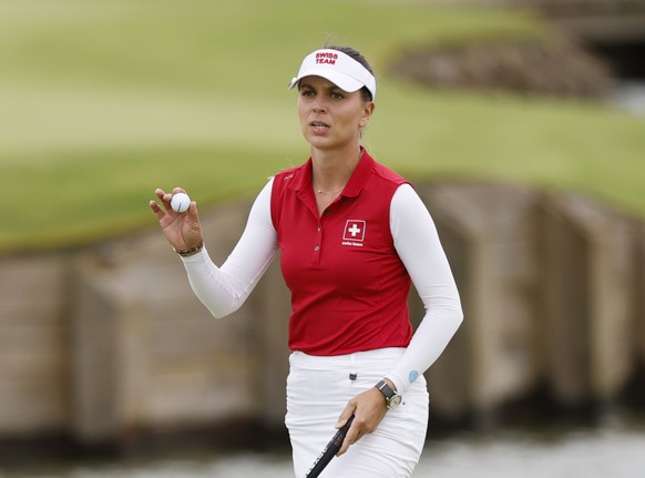 epa11540054 Morgane Metraux of Switzerland reacts on the 16th green during the third round of the Paris 2024 Olympic Games Women Individual Stroke Play golf competition at Le Golf National in Guyancou ...