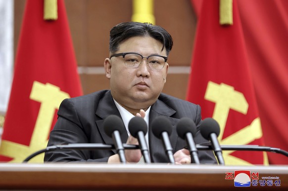 In this photo provided by the North Korean government, North Korean leader Kim Jong Un delivers a speech during a year-end plenary meeting of the ruling Workers? Party, which was held between Dec. 26, ...