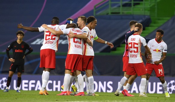 epaselect epa08602009 Players of Leipzig celebrate winning the UEFA Champions League quarter final match between RB Leipzig and Atletico Madrid in Lisbon, Portugal, 13 August 2020. EPA/Lluis Gene / PO ...