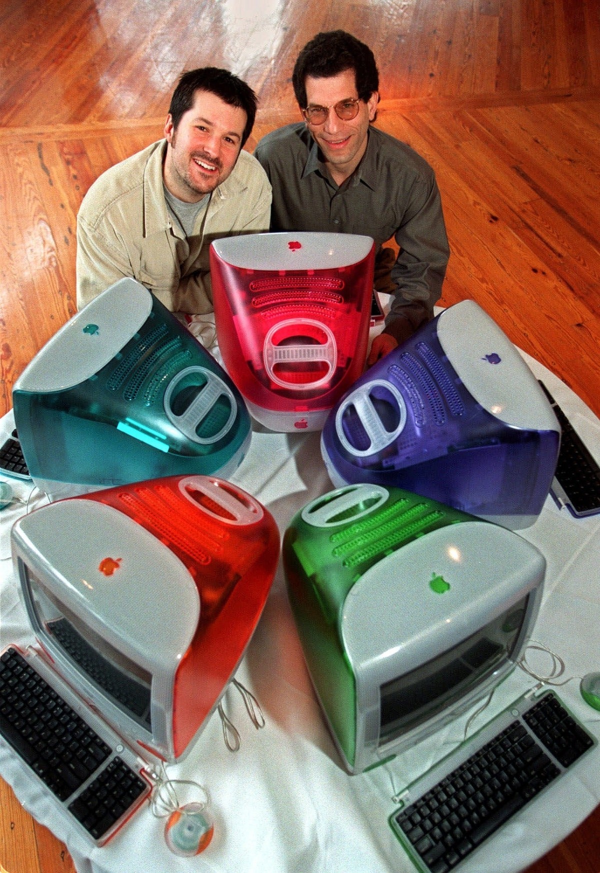 FILE - This March 19, 1999 file photo shows Jonathan Ive, left, Apple Computer's vice president of design, and Jon Rubinstein, Apple's senior vice president of engineering, posing behind fiv ...