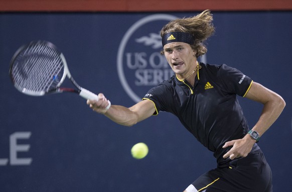 Alexander Zverev, of Germany, returns to Kevin Anderson, of South Africa, during quarterfinal play at the Rogers Cup tennis tournament Friday, Aug.11, 2017, in Montreal. (Paul Chiasson/The Canadian Pr ...