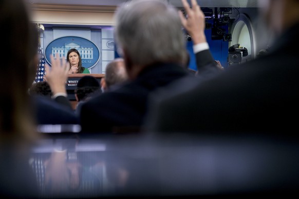 White House press secretary Sarah Huckabee Sanders calls on a member of the media during the daily press briefing at the White House, Wednesday, Aug. 15, 2018, in Washington. Sanders announced that Pr ...
