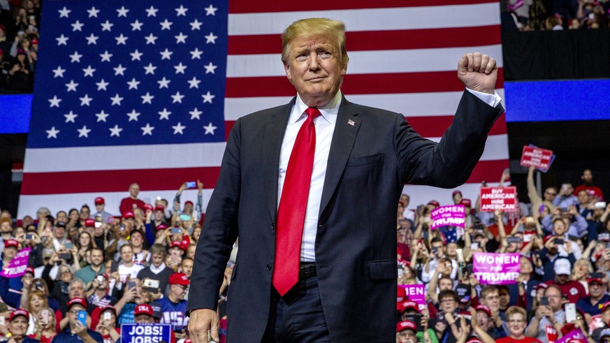 President Donald Trump gestures at a campaign rally at Van Andel Arena in Grand Rapids, Mich., on Thursday, March 28, 2019. (Cory Morse/MLive.com/The Grand Rapids Press via AP)