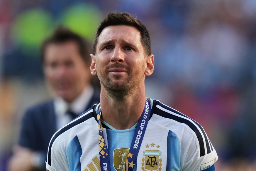 FILE - Argentina's Lionel Messi cries at the end of the World Cup final soccer match with Spain in East Rutherford, N.J., near New York, July 19, 2026. (AP Photo/Stephanie Scarbrough, File)
Lione ...