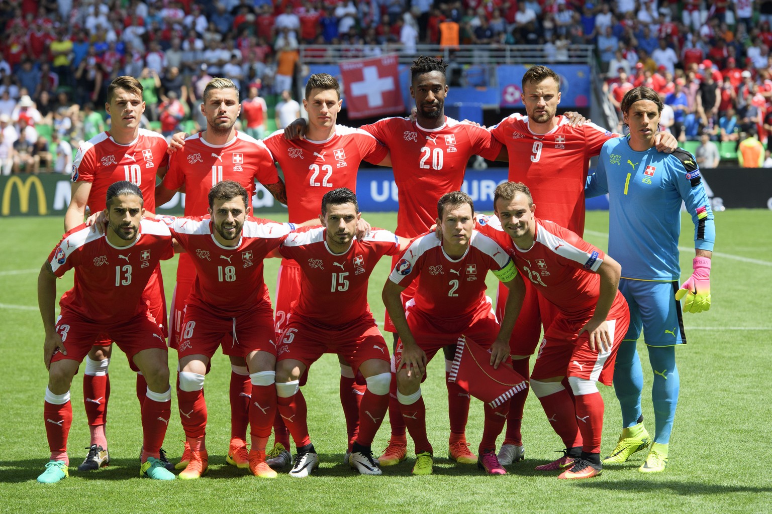 Behind from left, Swiss soccer players Granit Xhaka, Valon Behrami, Fabian Schaer, Johan Djourou, Haris Seferovic and goalkeeper Yann Sommer, in front from left, Ricardo Rodriguez, Admir Mehmedi, Bler ...