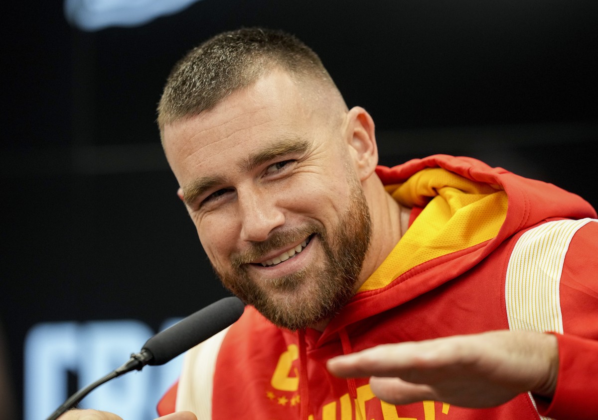 Kansas City Chiefs tight end Travis Kelce reacts when being asked about Taylor Swift in Frankfurt, Germany, Friday, Nov. 3, 2023. The Kansas City Chiefs are set to play the Miami Dolphins in a NFL gam ...