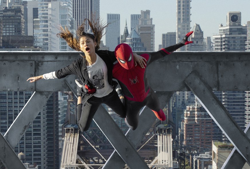 This image released by Sony Pictures shows Zendaya, left, and Tom Holland in Columbia Pictures&#039; &quot;Spider-Man: No Way Home.&quot; (Sony Pictures via AP)