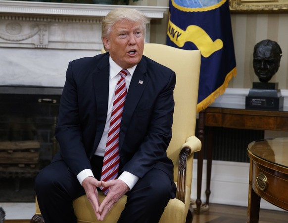 FILE - In this May 10, 2017 file photo, President Donald Trump talks to reporters in the Oval Office of the White House in Washington. (AP Photo/Evan Vucci, File)