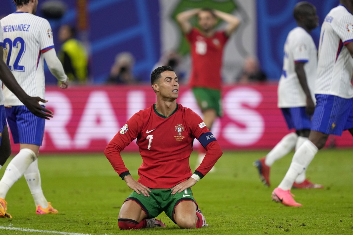 Portugal's Cristiano Ronaldo reacts after failing to score during a quarter final match between Portugal and France at the Euro 2024 soccer tournament in Hamburg, Germany, Friday, July 5, 2024. ( ...