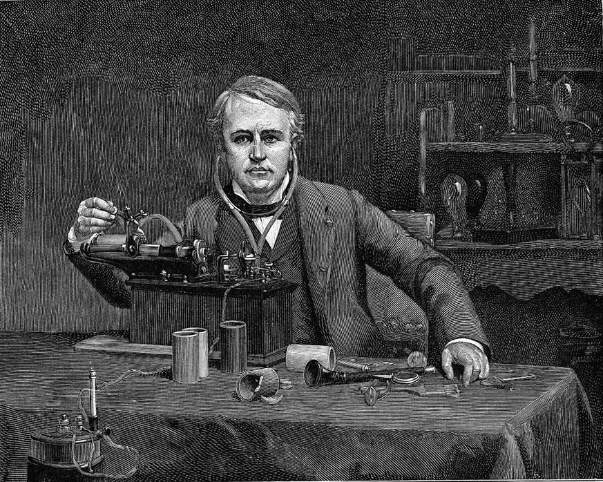 Thomas Alva Edison in front of his phonograph, vintage engraved illustration.  Of the Universe and Mankind, 1910.