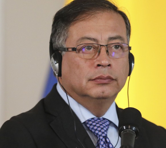 Colombia's President Gustavo Petro attends a meeting to review cooperation on security, trade and climate change issues, at the headquarters of the Colombian Presidency, Monday, Oct. 3, 2022 in Bogota ...