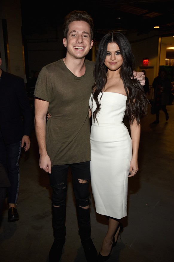 NEW YORK, NY - DECEMBER 11: Singers Charlie Puth (L) and Selen Gomez attend Z100&#039;s Jingle Ball 2015 at Madison Square Garden on December 11, 2015 in New York City. (Photo by Kevin Mazur/Getty Ima ...