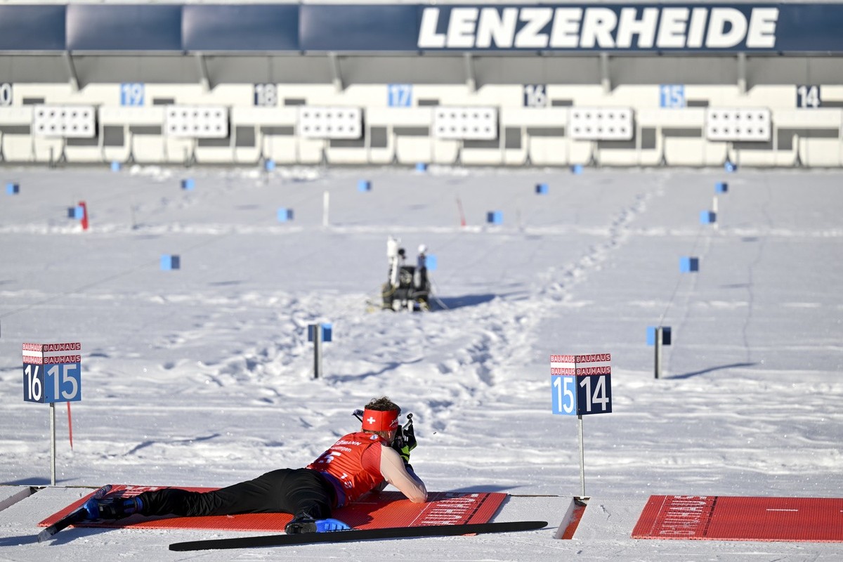 Sebastian Stalder of Switzerland warms up during the men's 15 km mass start race at the IBU Biathlon World Cup, on Sunday, December 17, 2023, in Lenzerheide, Switzerland. (KEYSTONE/Gian Ehrenzell ...