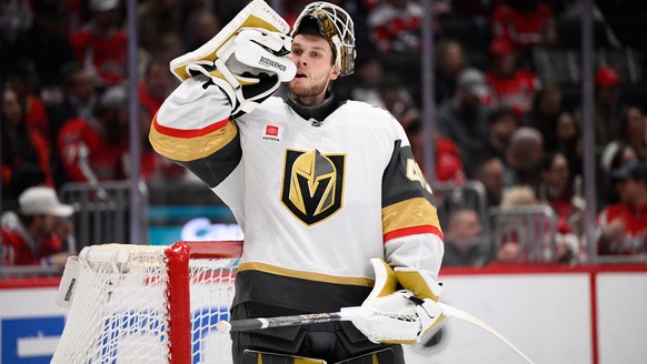 Vegas Golden Knights goaltender Akira Schmid takes a drink during the first period of an NHL hockey game against the Washington Capitals, Friday, Feb. 27, 2026, in Washington. (AP Photo/Nick Wass)
Gol ...
