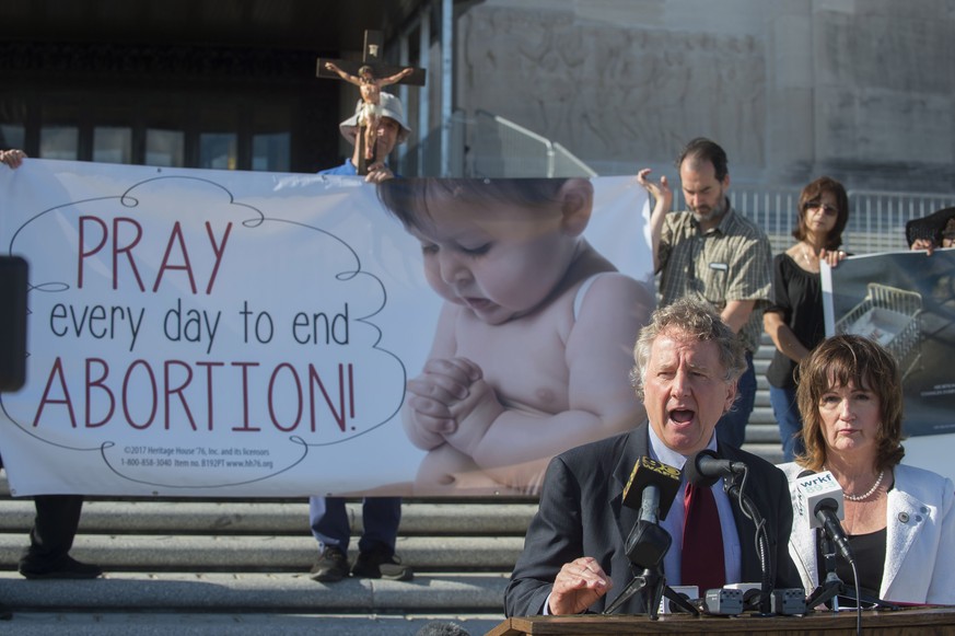 Sen. John Milkovich, R-Shreveport, left, and Rep. Valarie Hodges, R-Denham Springs, speak outside the State Capitol, after the House passed Milkovich&#039;s &#039;fetal heartbeat&#039; bill that would ...