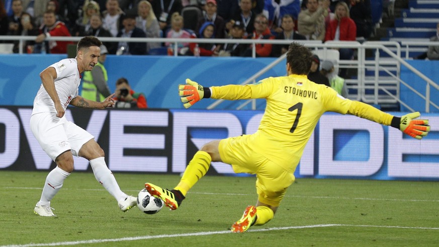 Serbia goalkeeper Vladimir Stojkovic blocks Switzerland&#039;s Mario Gavranovic during the group E match between Switzerland and Serbia at the 2018 soccer World Cup in the Kaliningrad Stadium in Kalin ...