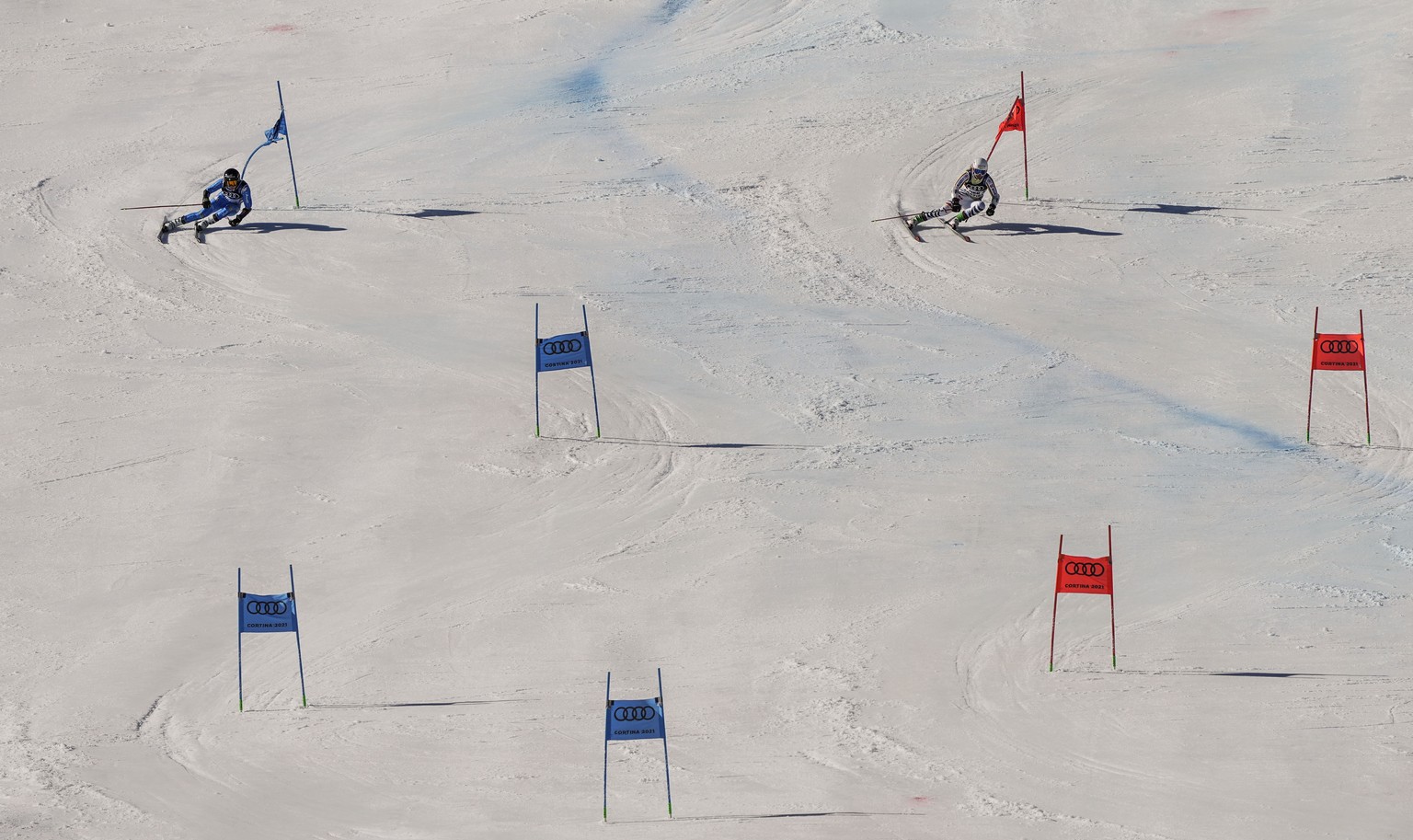 Italy&#039;s Laura Pirovano, left, competes with Germany Andrea Filser during a mixed team parallel slalom, at the alpine ski World Championships, in Cortina d&#039;Ampezzo, Italy, Wednesday, Feb. 17, ...