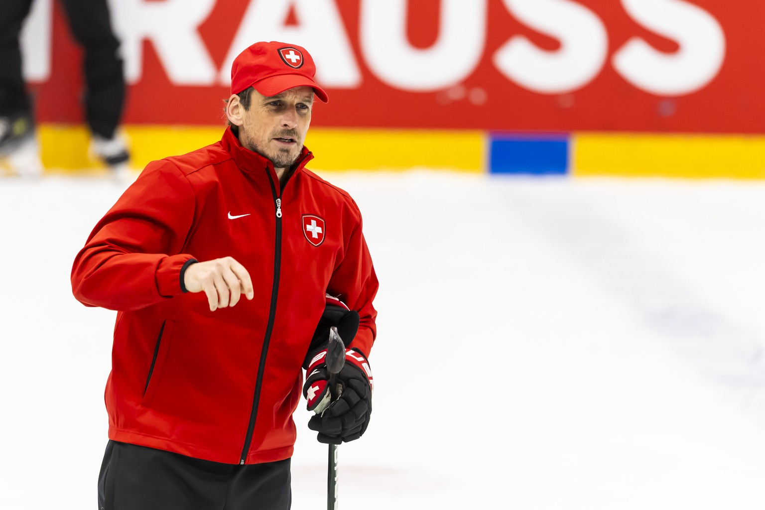 Patrick Fischer, head coach of Switzerland national ice hockey team, gestures, during a Switzerland team training session at the IIHF 2025 World Championship, at the Kvik Hockey Arena, in Herning, Den ...