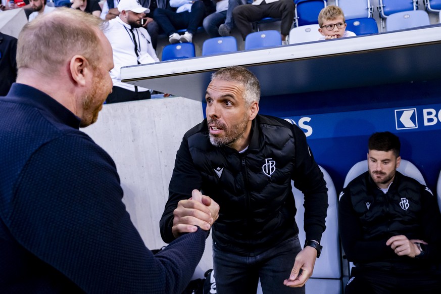 L&#039;entraineur Ludovic Magnin (LS), gauche, avec L&#039;entraineur Fabio Celestini (FCB), droite, lors de la rencontre de football de Super League entre FC Lausanne-Sport et FC Basel le mercredi 14 ...