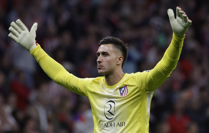 epa12890448 Atletico's goalkeeper Juan Musso gestures during the UEFA Champions League quarter-finals 2nd-leg soccer match between Atletico de Madrid and FC Barcelona at the Metropolitano stadium ...