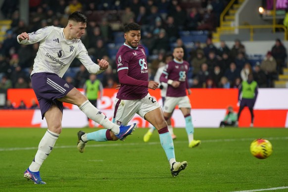 Manchester United's Benjamin Sesko scores during the Premier League soccer match between Burnley and Manchester United in Burnley, England Wednesday, Jan. 7, 2026. (AP Photo/Ian Hodgson)
Britain  ...