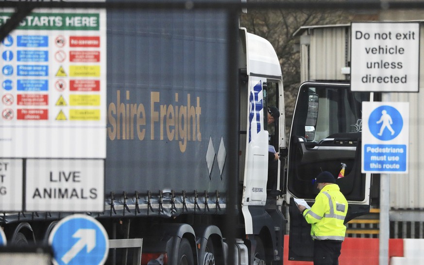 A heavy goods vehicles is checked at the Department of Agriculture, Environment and Rural Affairs checking site at Belfast Docks, Thursday Feb. 3, 2022. Officials in Northern Ireland sought legal advi ...