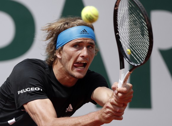 epa07622447 Alexander Zverev of Germany plays Fabio Fognini of Italy during their menâs round of 16 match during the French Open tennis tournament at Roland Garros in Paris, France, 03 June 2019. EP ...