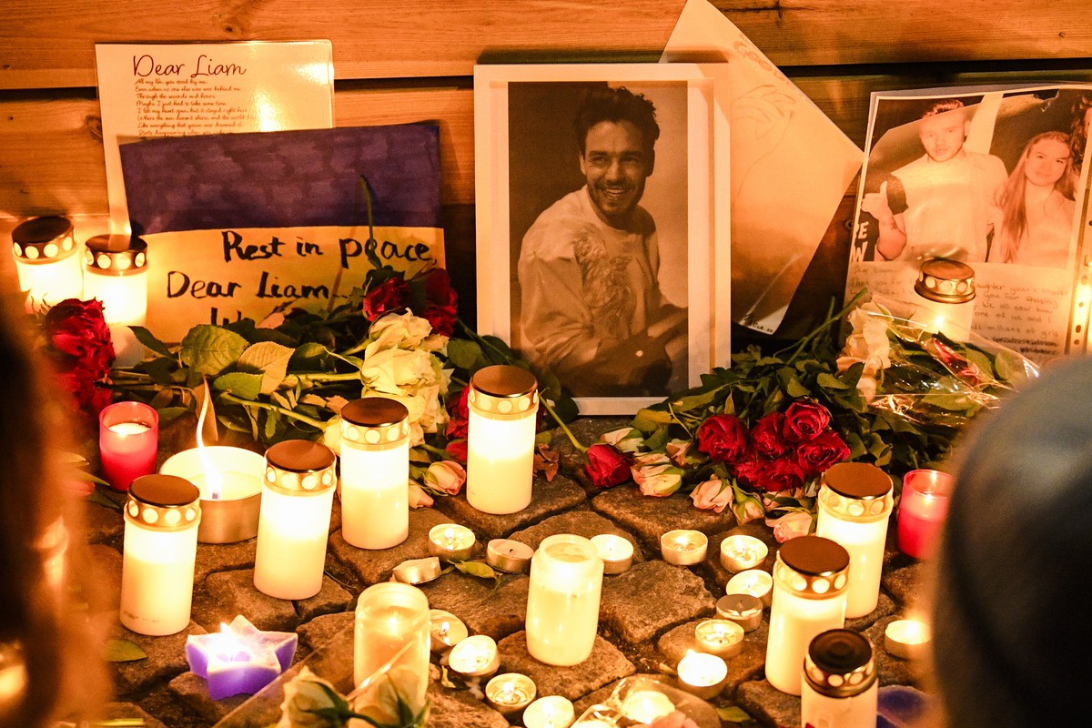 Fans gather for a vigil to pay tribute to late British singer Liam Payne, former member of the British pop band One Direction, outside the music studio where One Direction recorded their first two alb ...