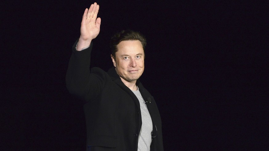 FILE - SpaceX&#039;s Elon Musk waves while providing an update on Starship, on Feb. 10, 2022, near Brownsville, Texas. Twitter on Thursday, Dec. 15, 2022, suspended the accounts of journalists who cov ...