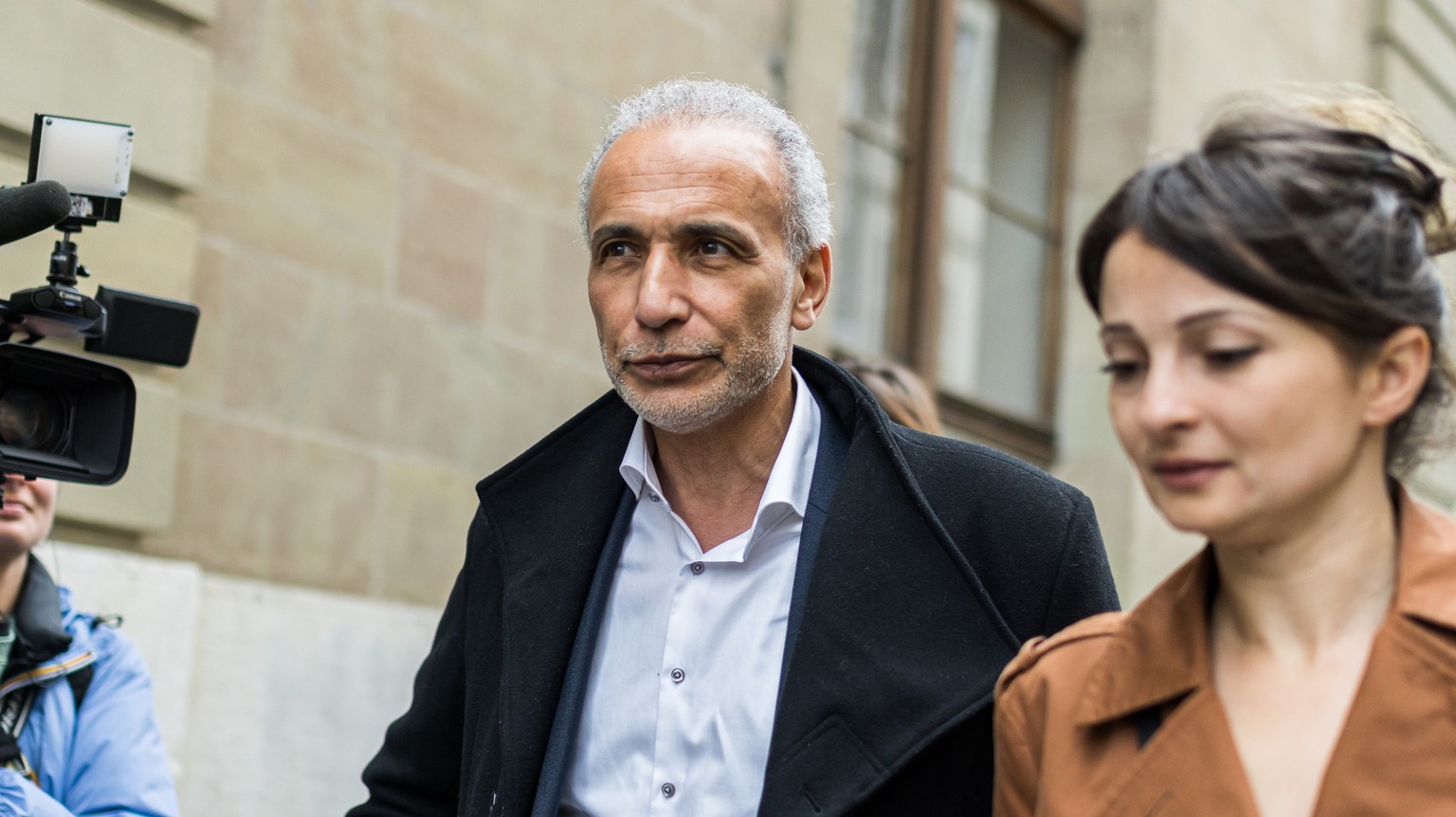 epa10630669 Swiss leading Islamic scholar Tariq Ramadan (C) arrives at Geneva&#039;s courthouse for a second day of hearing with Geneva&#039;s prosecutor as part of an investigation over sexual assaul ...