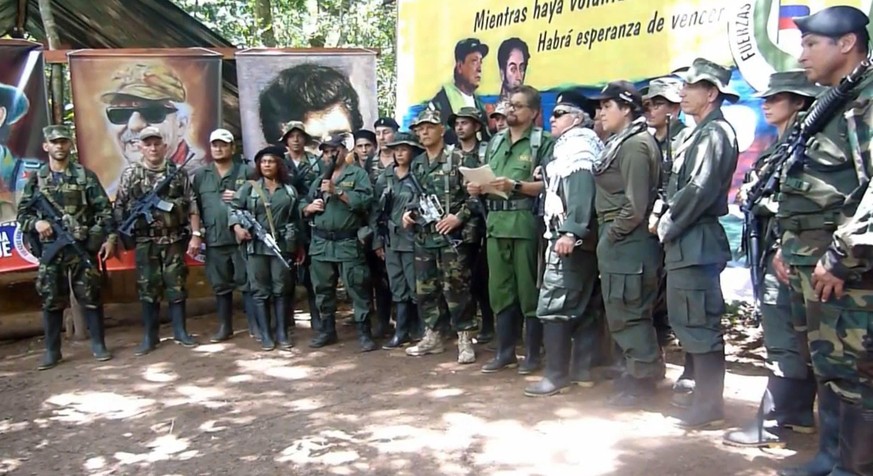 epa07801022 A still image taken from a handout video released by the Revolutionary Armed Forces of Colombia (FARC) on 29 August 2019 shows FARC dissident Ivan Marquez (C) with other former leaders suc ...