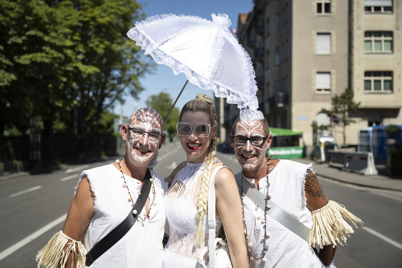 epa13156409 Participants pose ahead of the start of the 33rd Street Parade in the city center of Zurich, Switzerland, 08 August 2026. The annual dance music event runs this year under the theme ' ...