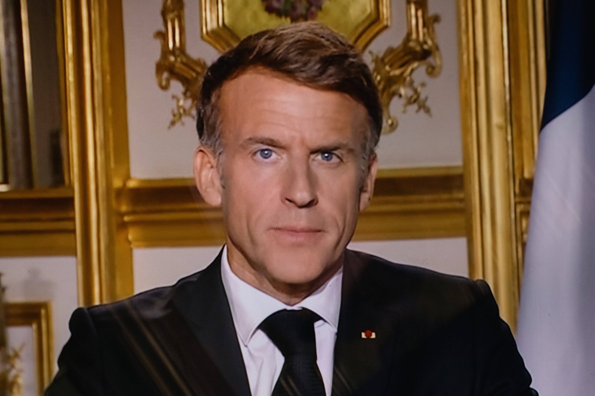 Paris, France, October 18, 2026 - This photograph shows a television monitor broadcasting France s President Emmanuel Macron giving a speech from the Elysee Presidential Palace the day after riots and ...