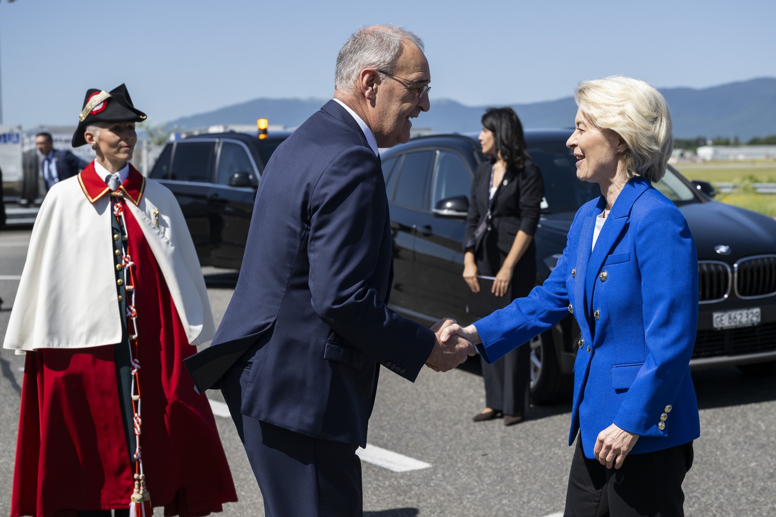 KEYPIX - Swiss Federal President Guy Parmelin, left, welcomes European Commission President Ursula von der Leyen, right, prior to a trilateral meeting on the sideline of the the Evian G7 summit in Gen ...