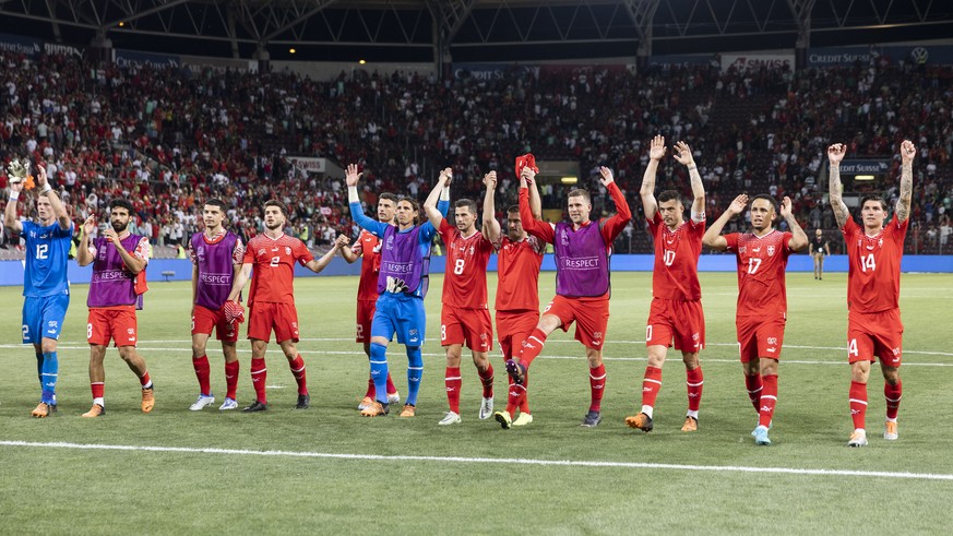 The joy of the players of the Swiss team, during the UEFA Nations League group A2 soccer match between Switzerland and Portugal at the Stade de Geneve stadium, in Geneva, Switzerland, Sunday, June 12, ...