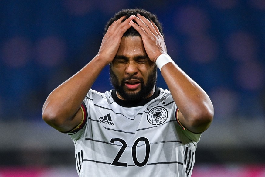 epa09109211 Germany's Serge Gnabry reacts during the FIFA World Cup 2022 qualifying soccer match between Germany and North Macedonia in Duisburg, Germany, 31 March 2021. EPA/SASCHA STEINBACH