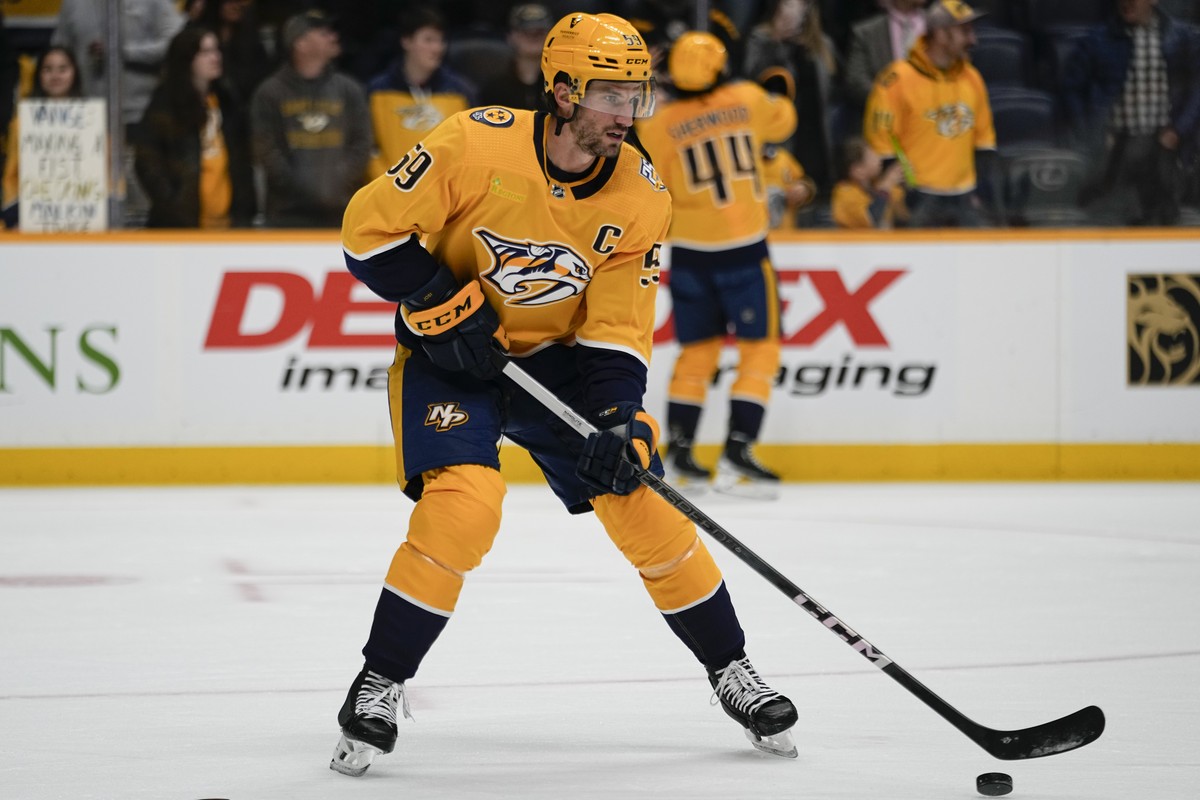 Nashville Predators defenseman Roman Josi (59) warms up before an NHL hockey game against the Pittsburgh Penguins, Tuesday, Nov. 28, 2023, in Nashville, Tenn. (AP Photo/George Walker IV)