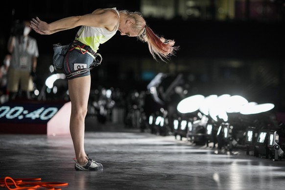 Janja Garnbret, of Slovenia, salutes after competing the lead portion of the women&#039;s sport climbing final at the 2020 Summer Olympics, Friday, Aug. 6, 2021, in Tokyo, Japan. (AP Photo/David Goldm ...