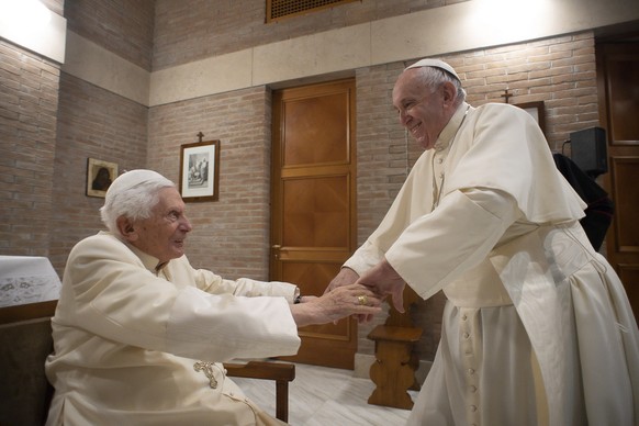 epa08849568 A handout picture provided by the Vatican Media shows Pope Francis (R) visit the Pope Emeritus, Benedict XVI, in the chapel of the Mater Ecclesiae monastery, Vatican City, 28 November 2020 ...