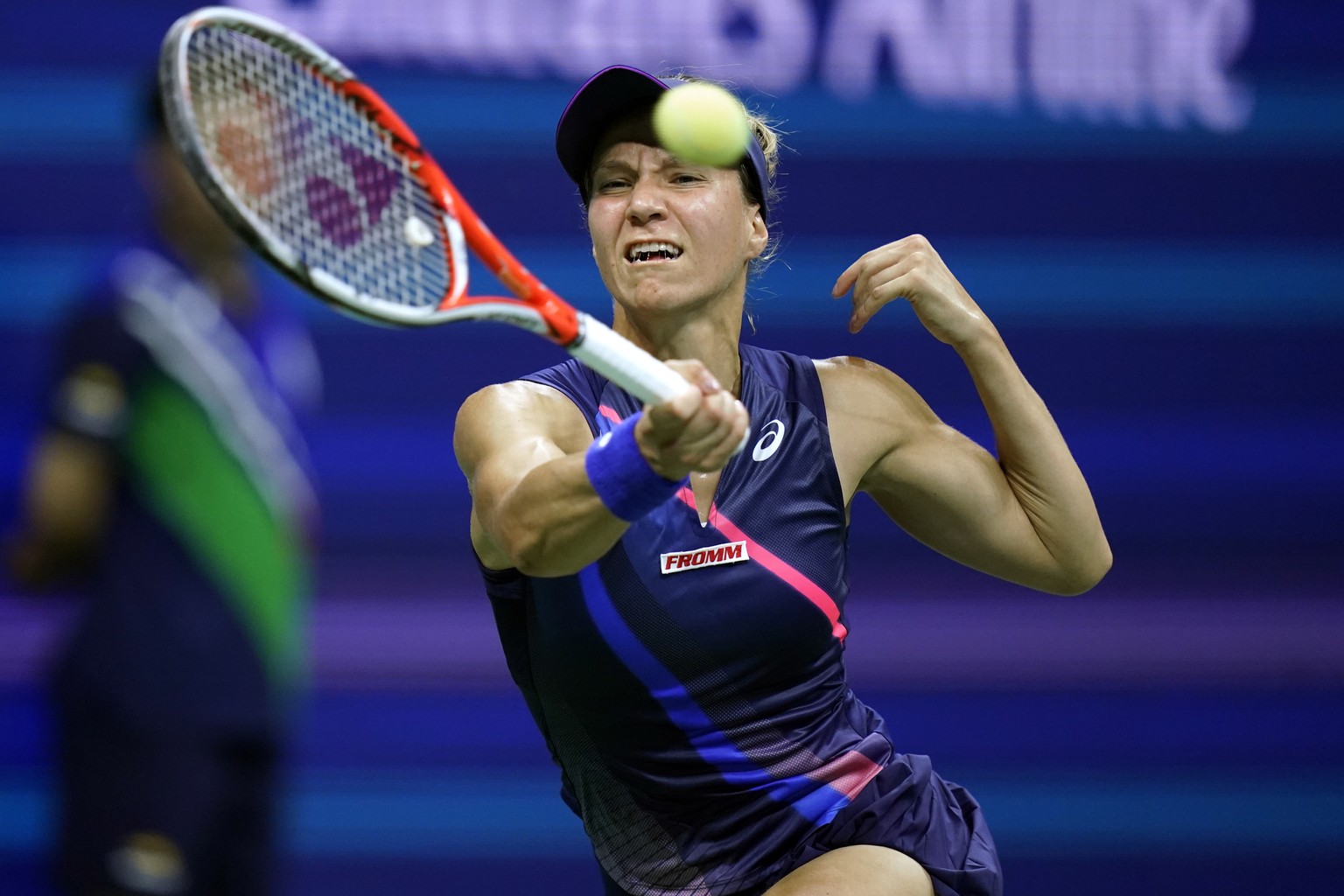 Viktorija Golubic, of Switzerland, returns the ball during the first round of the US Open tennis championships, Tuesday, Aug. 31, 2021, in New York. (AP Photo/Frank Franklin II)