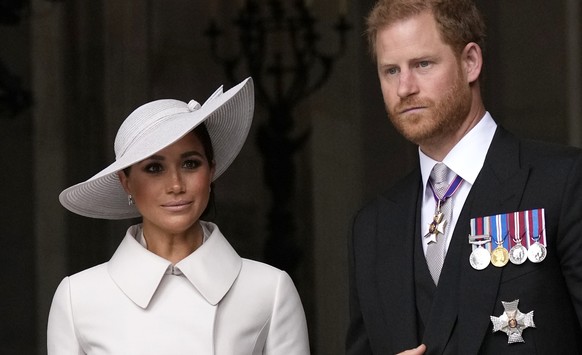 FILE - Prince Harry and Meghan Markle, Duke and Duchess of Sussex leave after a service of thanksgiving for the reign of Queen Elizabeth II at St Paul&#039;s Cathedral in London, Friday, June 3, 2022. ...