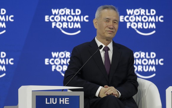 Liu He, member of the Political Bureau of CPC Central Committee, listens during the annual meeting of the World Economic Forum in Davos, Switzerland, Wednesday, Jan. 24, 2018. (AP Photo/Markus Schreib ...