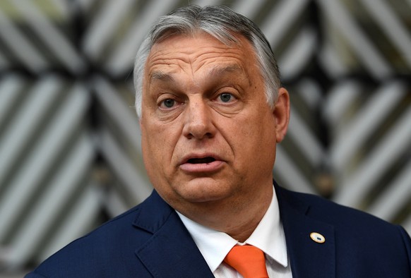 Hungary&#039;s Prime Minister Viktor Orban talks to journalists as he arrives for an EU summit at the European Council building in Brussels, Thursday, June 24, 2021. At their summit in Brussels, EU le ...