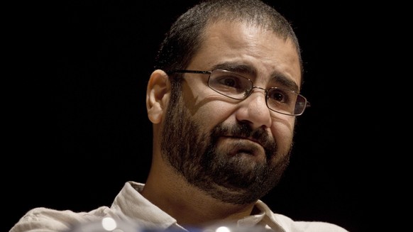 FILE - Egypt&#039;s leading pro-democracy activist Alaa Abdel-Fattah speaks during a conference at the American University in Cairo, Egypt, Sept. 22, 2014. The family of imprisoned activist Abdel-Fatt ...