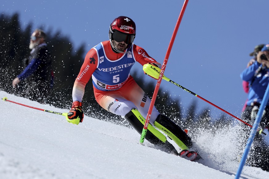 Switzerland&#039;s Loic Meillard competes in the first run of an alpine ski, men&#039;s World Cup slalom race, in Saalbach, Austria, Sunday, March 17, 2024. (AP Photo/Marco Trovati)