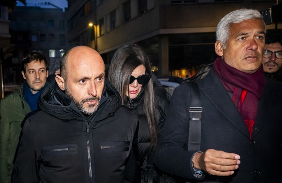The owners of the bar in Crans-Montana, where the deadly fire happened on New Year's Day, Jacques and Jessica Moretti from France, center, arrive with their lawyers Patrick Michod and Nicola Meie ...