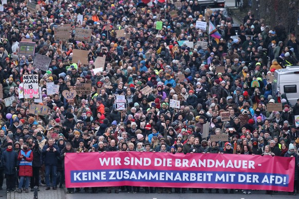 epa11870306 Protesters attend a rally in front of the Brandenburg Gate in Berlin, Germany, 02 February 2025. People gathered to protest against the Christian Democratic Union&#039;s (CDU) cooperation  ...